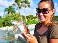 Turtle Farm-Young Woman Holding Turtle